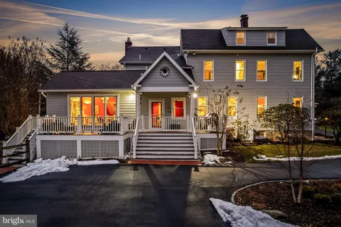 a front view of a house with swimming pool