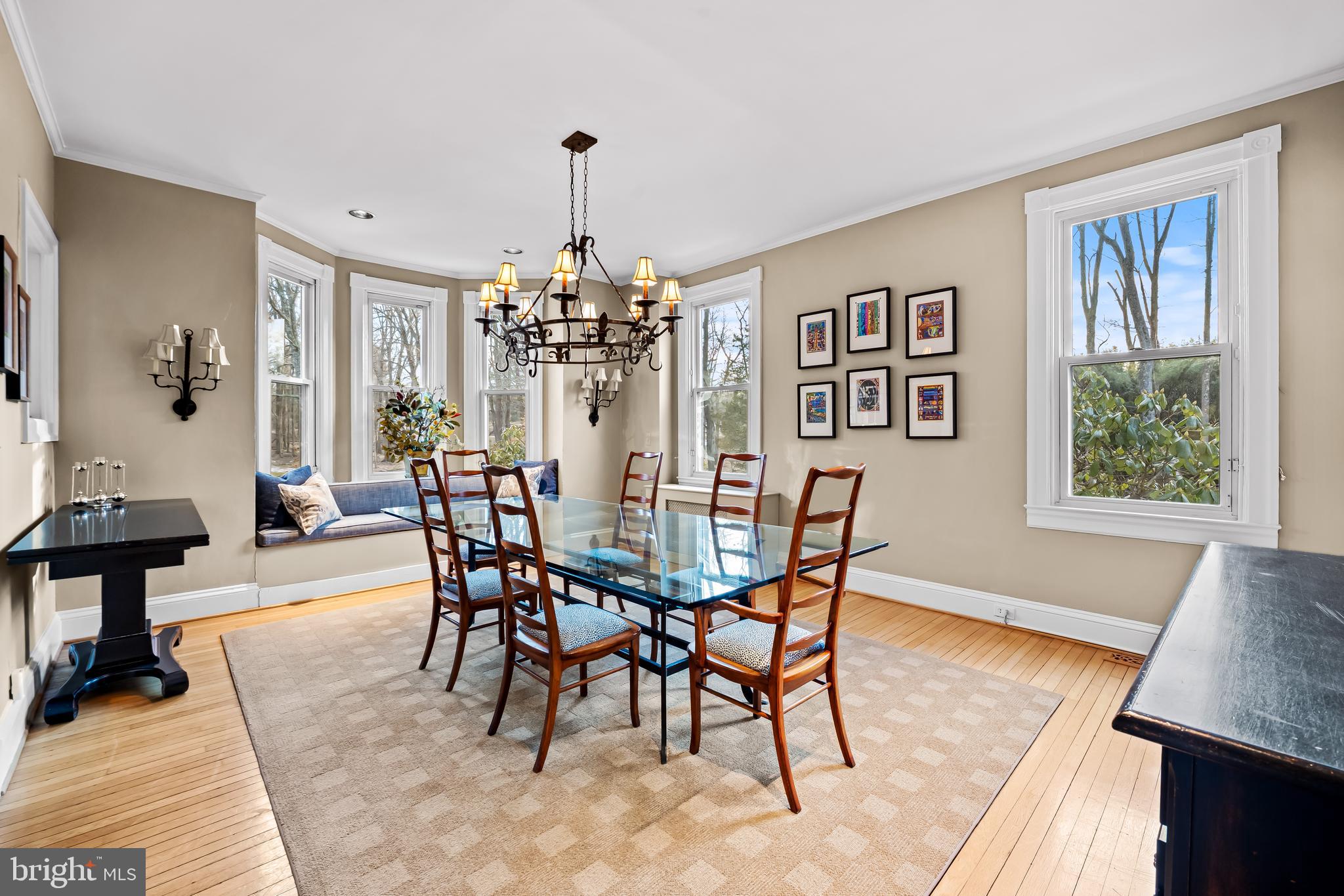 8412 Stevenson Road Baltimore, MD 21208 - Photo 23 of 77 a view of a dining room with furniture window and wooden floor