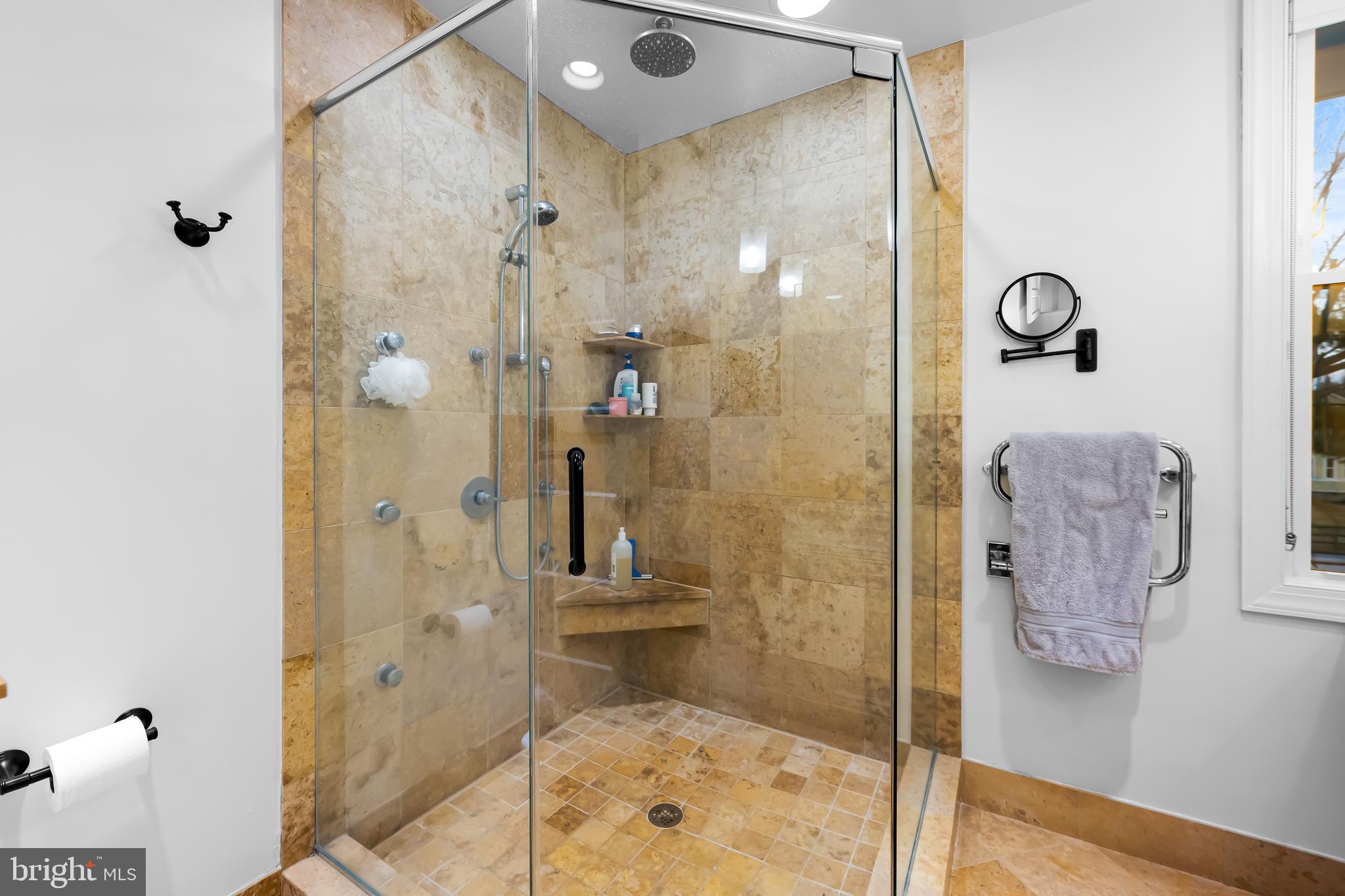 8412 Stevenson Road Baltimore, MD 21208 - Photo 47 of 77 a bathroom with a shower and a sink