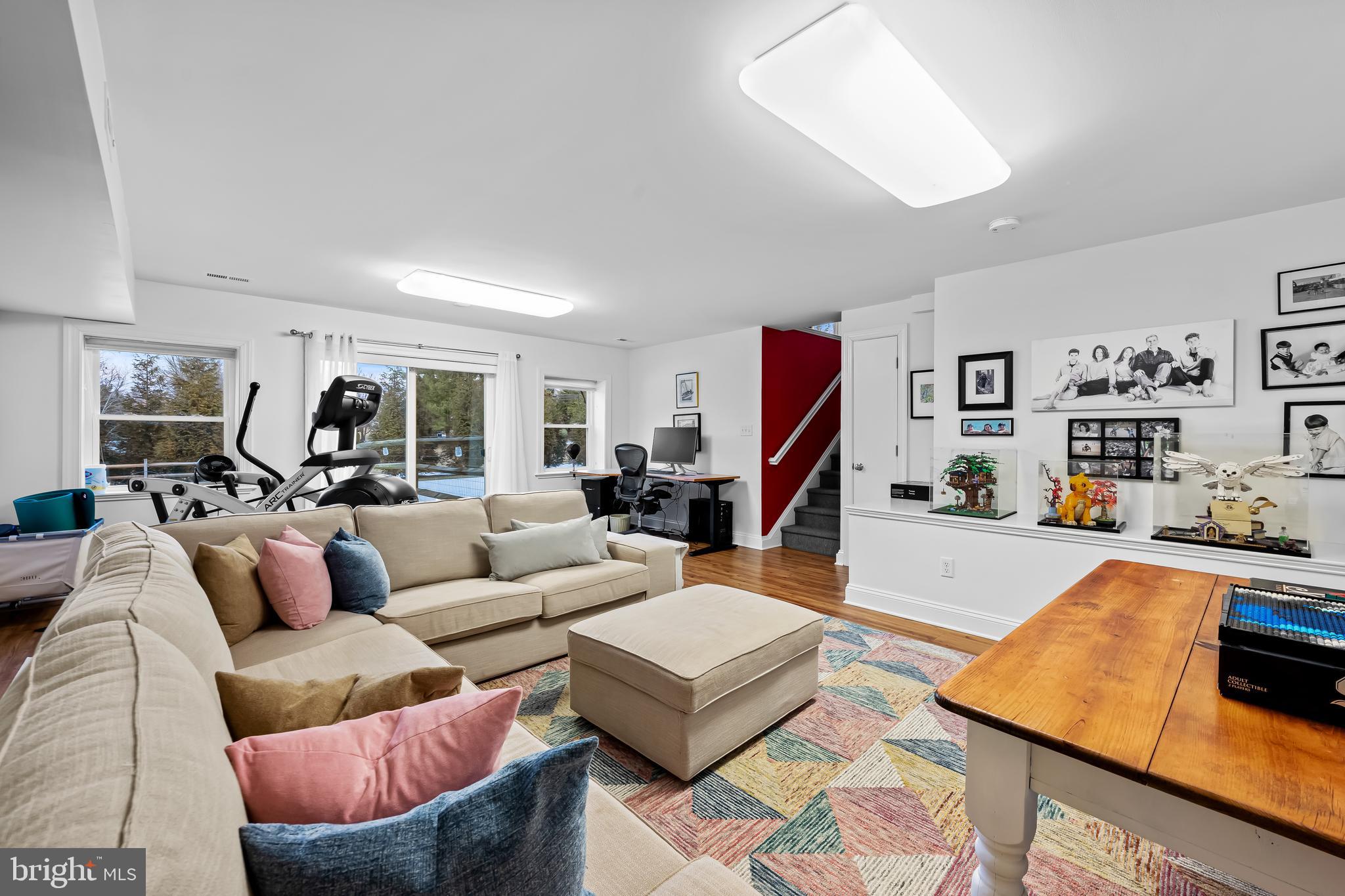 8412 Stevenson Road Baltimore, MD 21208 - Photo 65 of 77 a living room with furniture and a flat screen tv