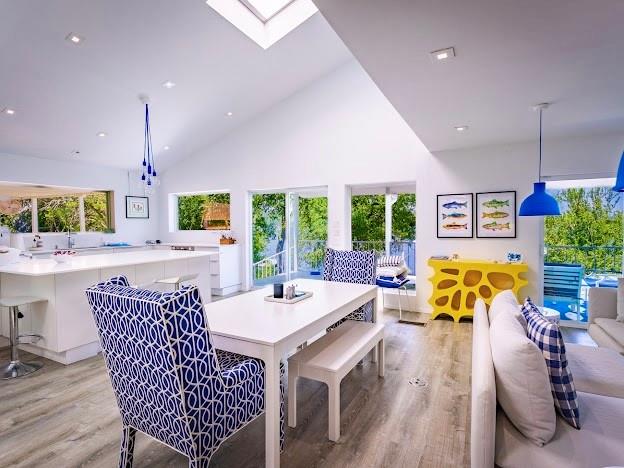 2459 Upper Burma Road Graford, TX 76449 - Photo 15 of 40 a view of a dining room with furniture window and wooden floor