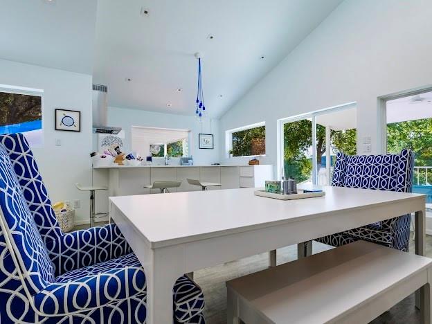 2459 Upper Burma Road Graford, TX 76449 - Photo 16 of 40 a view of kitchen island with furniture and wooden floor