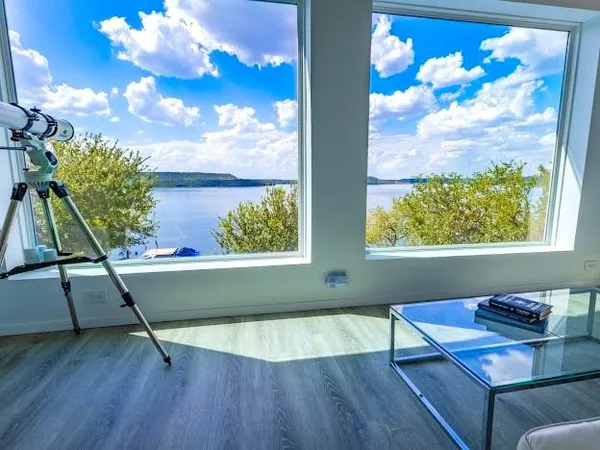 a bedroom with bed and window