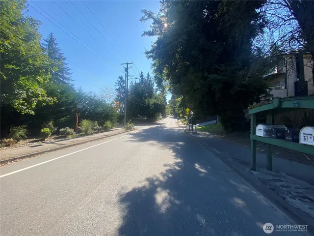a view of a street with fire pit