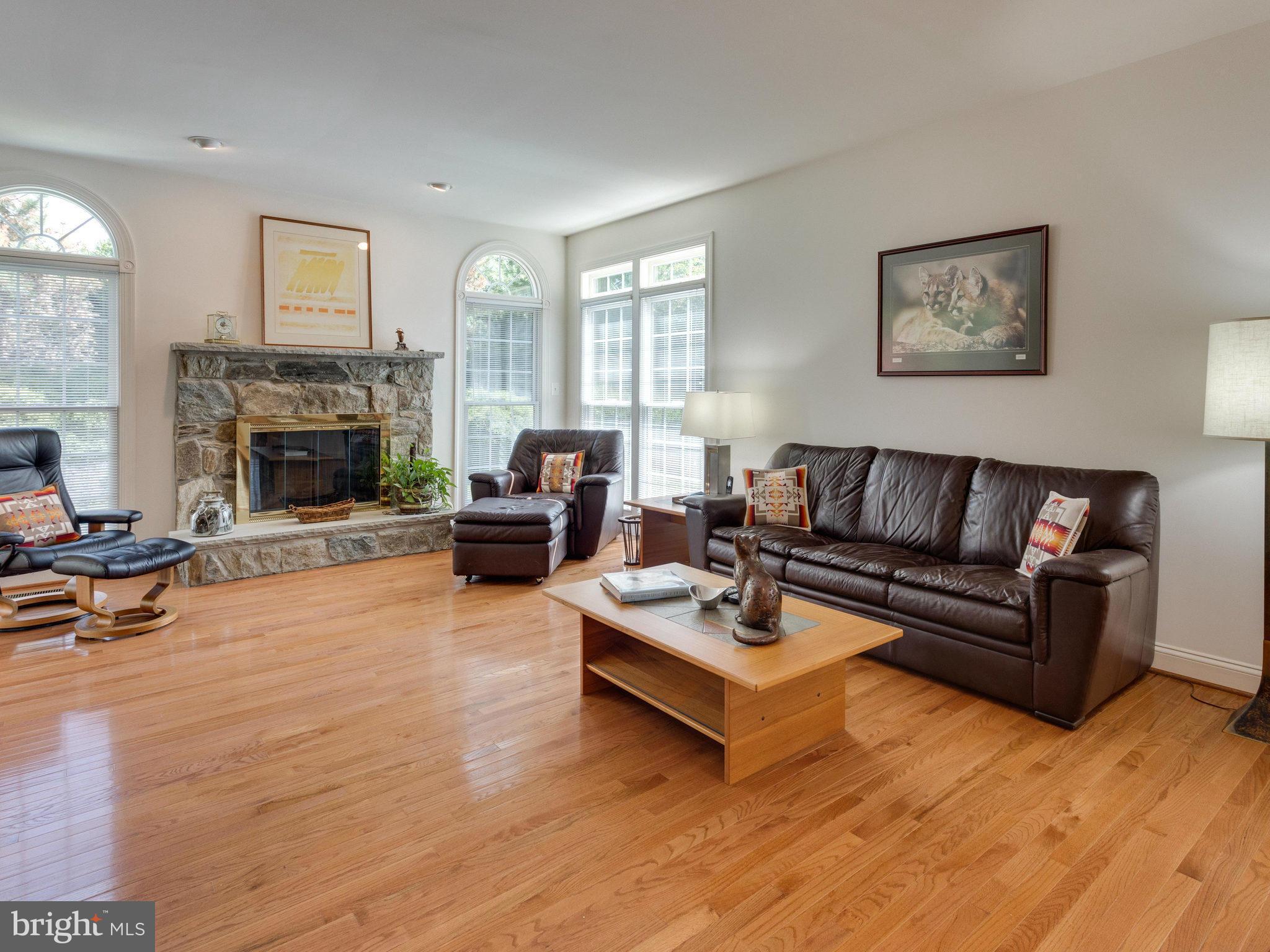 2782 Cody Road Vienna, VA 22181 - Photo 11 of 30 Family Room with Gas Fireplace and Hardwood Floor