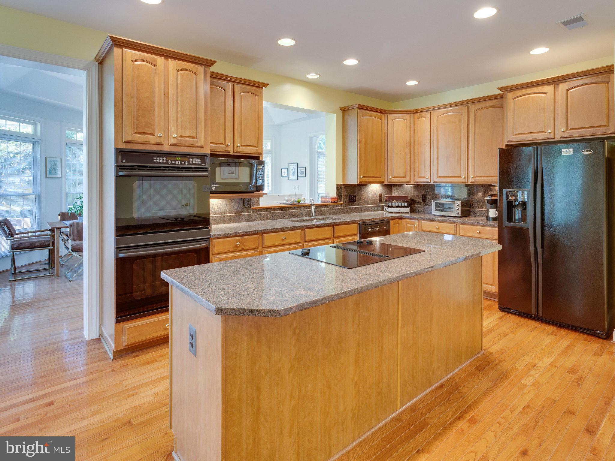 2782 Cody Road Vienna, VA 22181 - Photo 3 of 30 Kitchen has Cherry Cabinetry