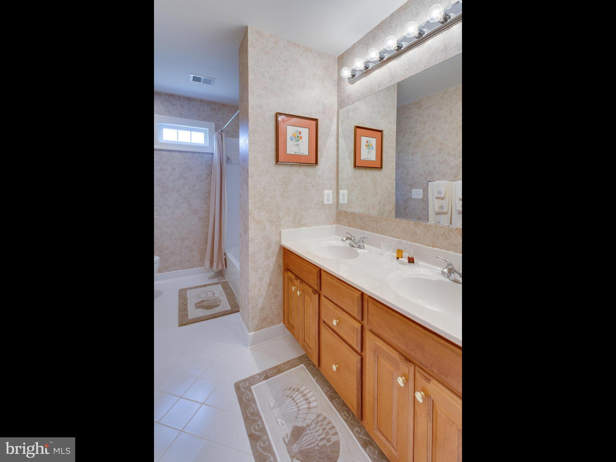 2782 Cody Road Vienna, VA 22181 - Photo 22 of 30 Spacious Hall Bath with Double Bowl Vanity