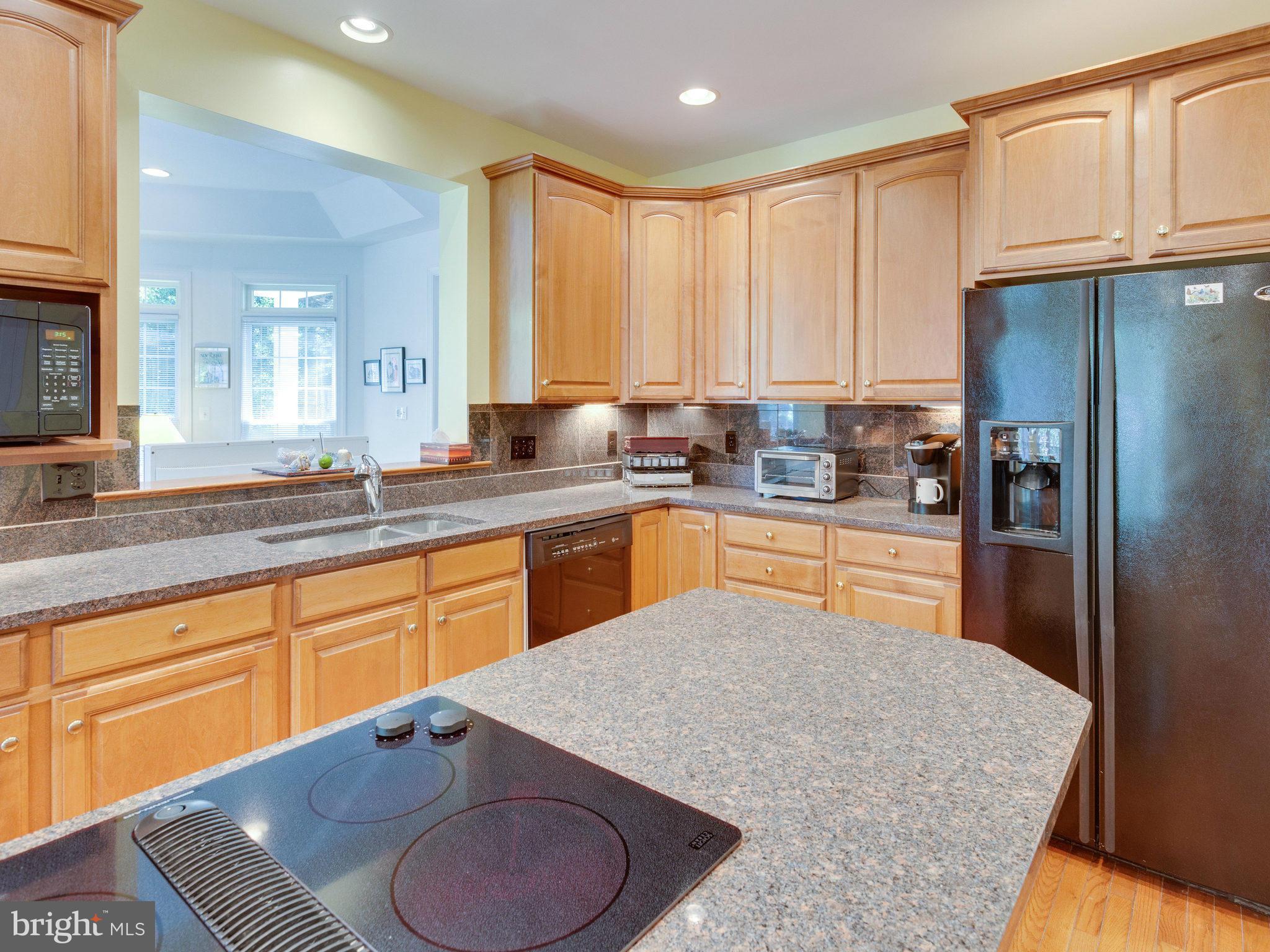 2782 Cody Road Vienna, VA 22181 - Photo 5 of 30 Granite Countertops and Recessed Lighting