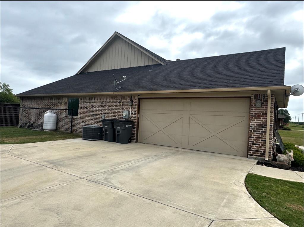 470 Wilson Bend Road Millsap, TX 76066 - Photo 34 of 39 a front view of a house with garage