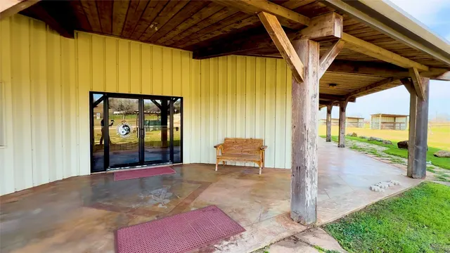 a view of a lake with houses in the back