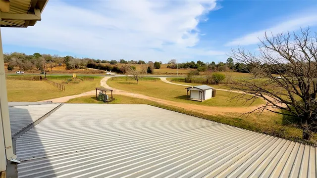 a view of a swimming pool with an ocean view