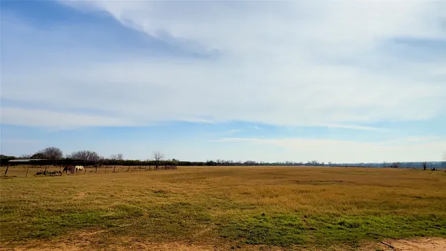 a view of swimming pool with outdoor seating