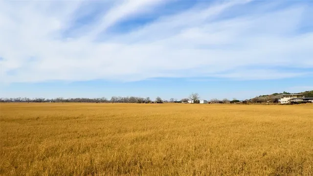 a view of a lake with beach and ocean view