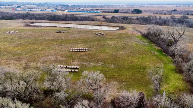 a view of a swimming pool and an outdoor seating