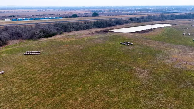 a view of a big yard with an outdoor space