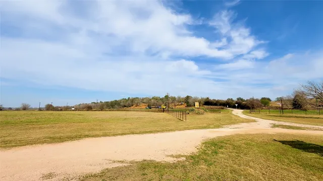 a front view of a building with garden