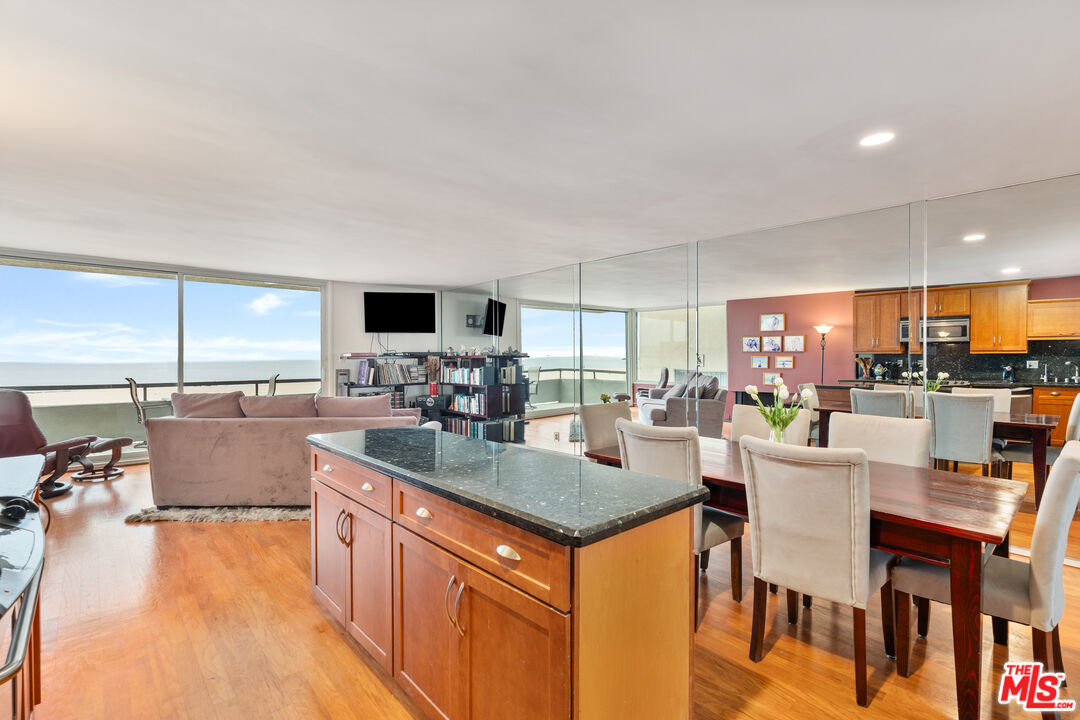 6 Fleet Street, Unit 203 Marina del Rey, CA 90292 - Photo 8 of 25 a large kitchen with a large counter top appliances and cabinets