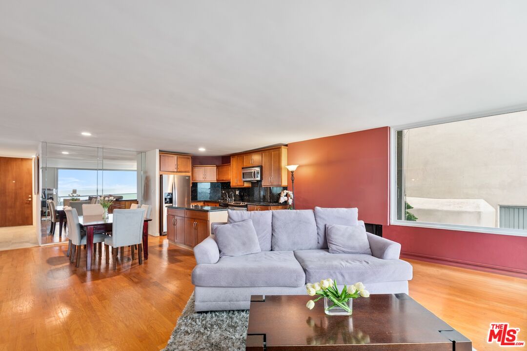 6 Fleet Street, Unit 203 Marina del Rey, CA 90292 - Photo 10 of 25 a living room with furniture and wooden floor