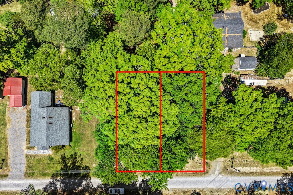 0 Davis Drive Reedville, VA 22539 - Photo 2 of 9 an aerial view of a house with a yard and large trees