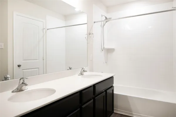 a bathroom with a sink and a toilet