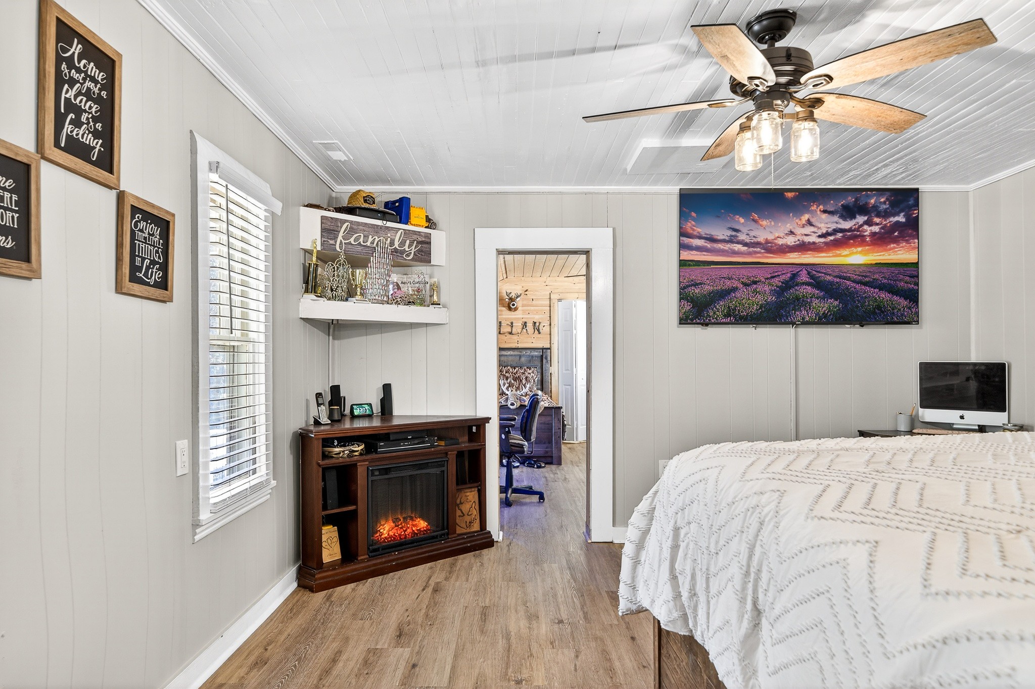 1700 Hannah Branch Road Liberty, TN 37095 - Photo 15 of 59 a bedroom with a bed and a chandelier