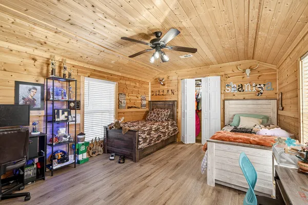 a view of a storage and utility room with washer and dryer