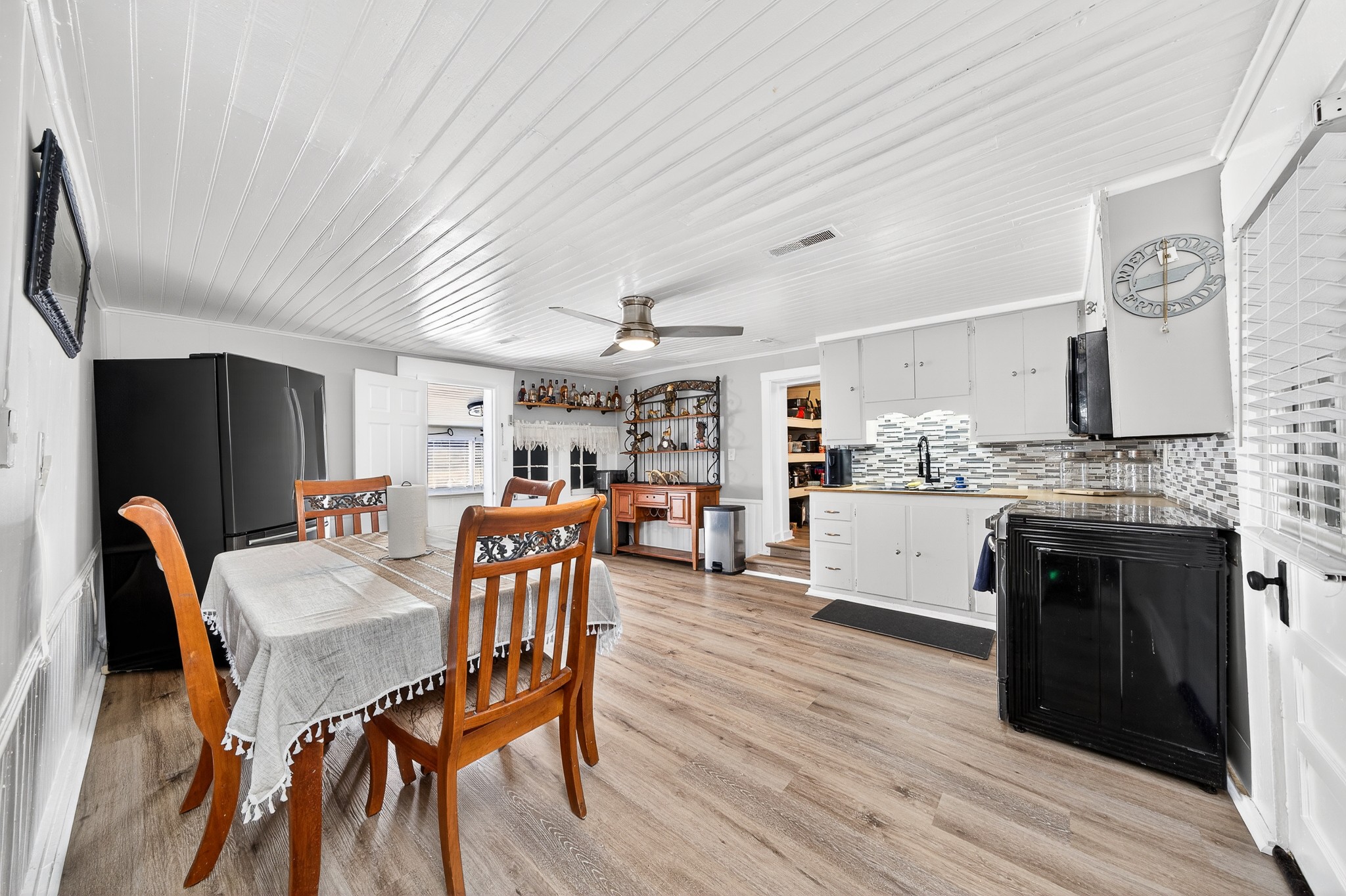 1700 Hannah Branch Road Liberty, TN 37095 - Photo 22 of 59 a dining room with furniture and wooden floor