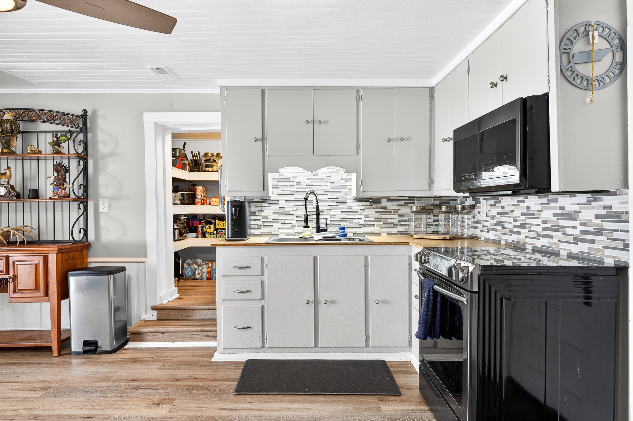 1700 Hannah Branch Road Liberty, TN 37095 - Photo 23 of 59 a kitchen with stainless steel appliances granite countertop a stove and cabinets