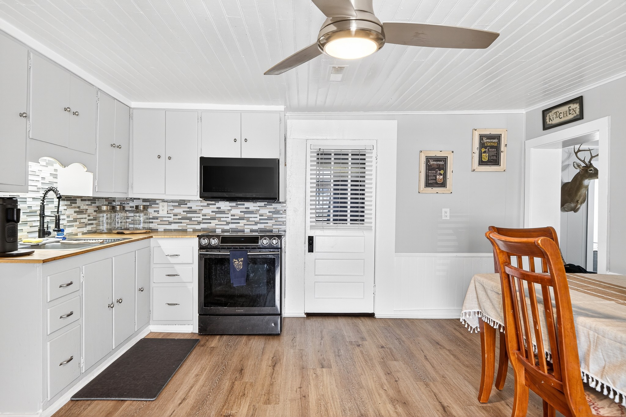 1700 Hannah Branch Road Liberty, TN 37095 - Photo 26 of 59 a kitchen with stainless steel appliances a stove microwave and a refrigerator