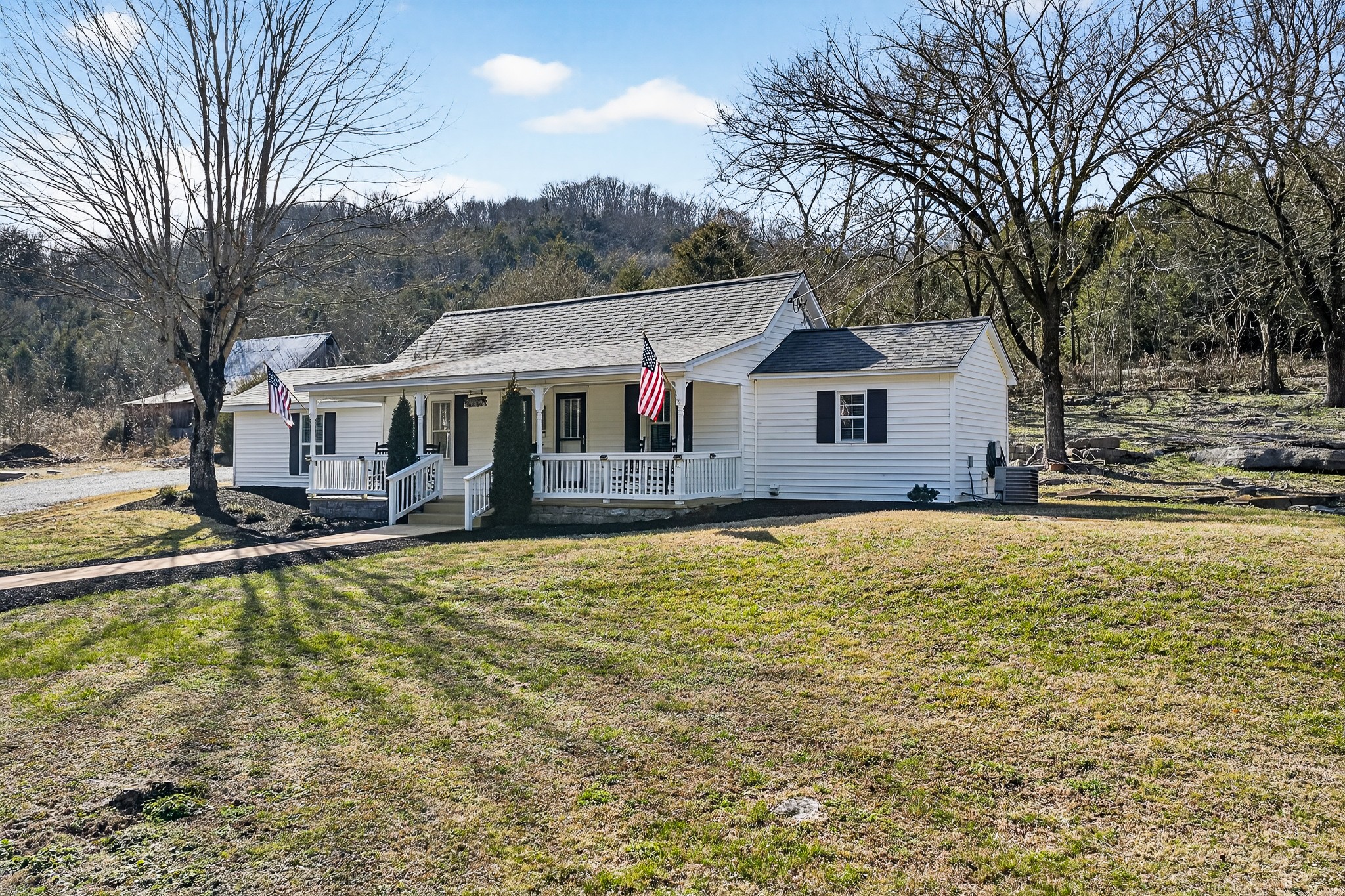 1700 Hannah Branch Road Liberty, TN 37095 - Photo 4 of 59 a front view of a house with swimming pool