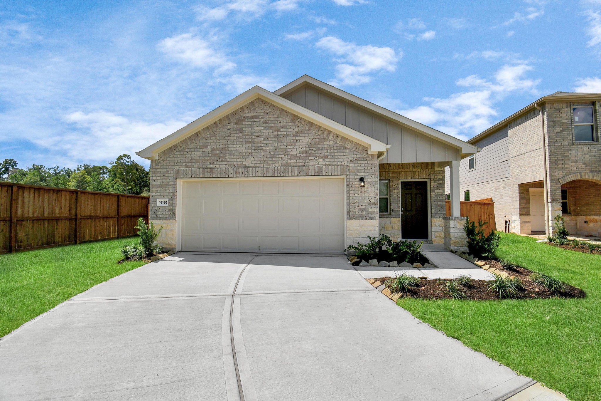 16150 Elbridge Court Conroe, TX 77302 - Photo 2 of 46 Nestled at the end of a peaceful cul-de-sac, from the moment you lay eyes on it, you're greeted by an elegant facade that exudes curb appeal.