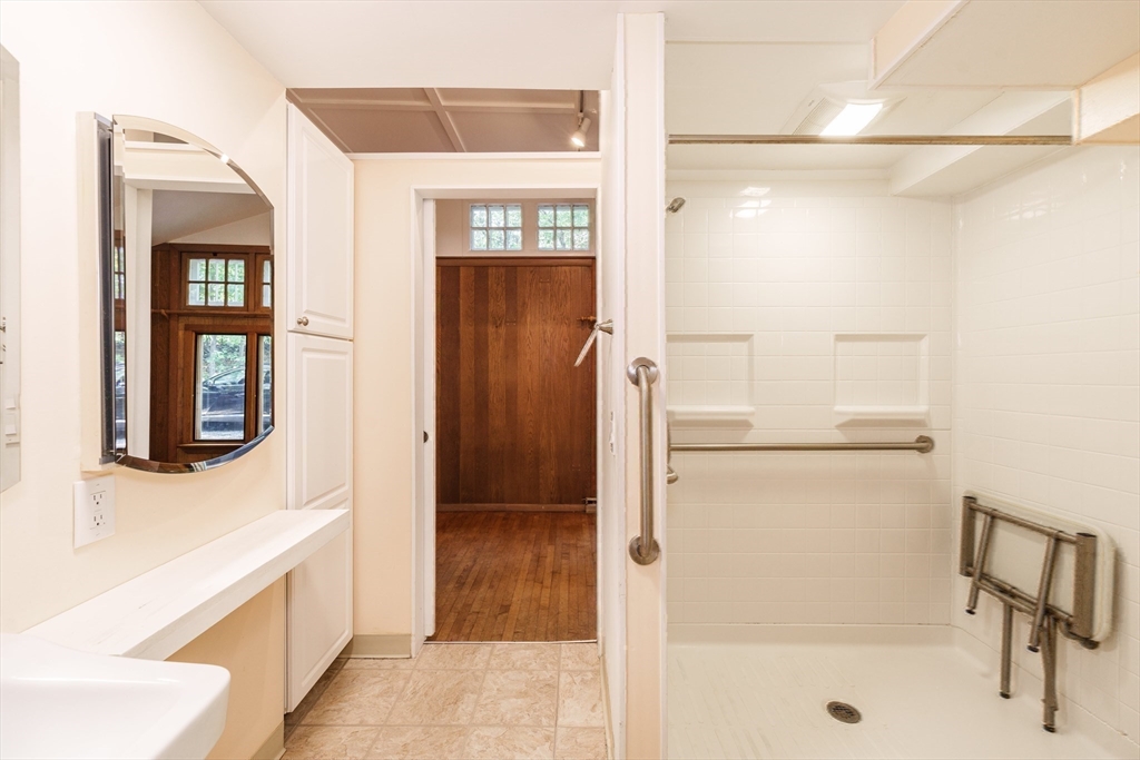 6 Megonko Road Natick, MA 01760 - Photo 17 of 40 a bathroom with a bathtub and a shower