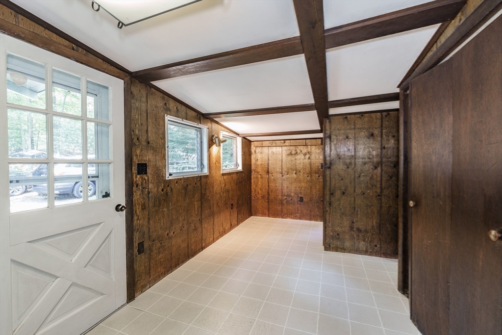 6 Megonko Road Natick, MA 01760 - Photo 21 of 40 a bathroom with a glass shower door