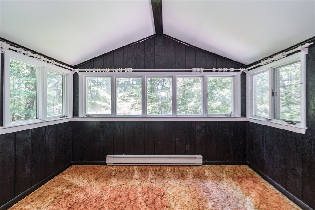 6 Megonko Road Natick, MA 01760 - Photo 23 of 40 a view of an empty room with a window