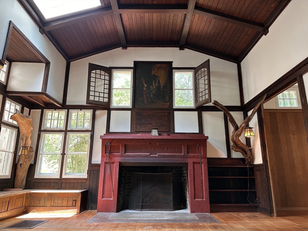 6 Megonko Road Natick, MA 01760 - Photo 5 of 40 a living room with a fireplace windows and a fireplace