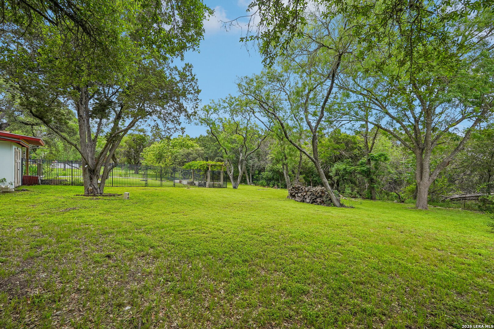 20632 Timber Rose Drive Garden Ridge, TX 78266 - Photo 42 of 46 a view of green field with trees in the background