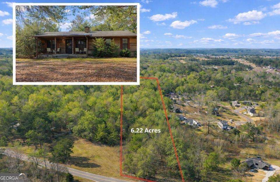 2164 Yukon Road Ellijay, GA 30536 - Photo 1 of 43 a view of a yard from a window
