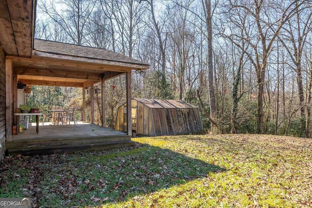 2164 Yukon Road Ellijay, GA 30536 - Photo 10 of 43 a view of a backyard with large tree