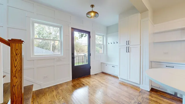 a view of a bedroom with a window and a bathroom