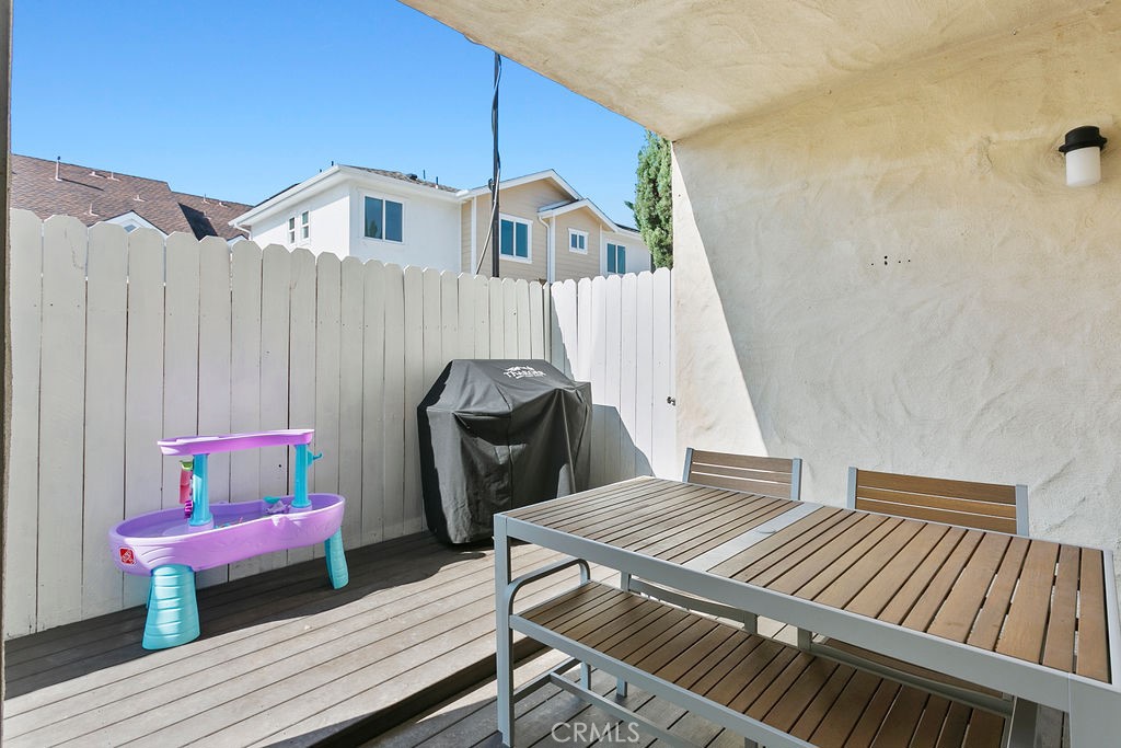 2575 Elden Avenue, Unit 2 Costa Mesa, CA 92627 - Photo 11 of 12 a bedroom with a bed and a table