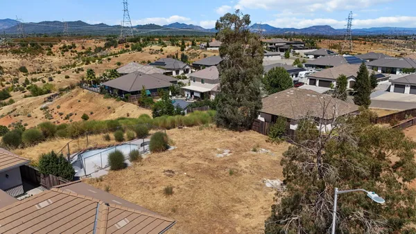 a view of a terrace with a lake view