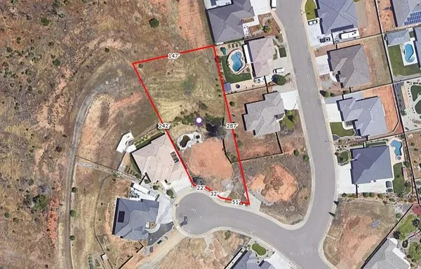 an aerial view of a city with lots of residential buildings