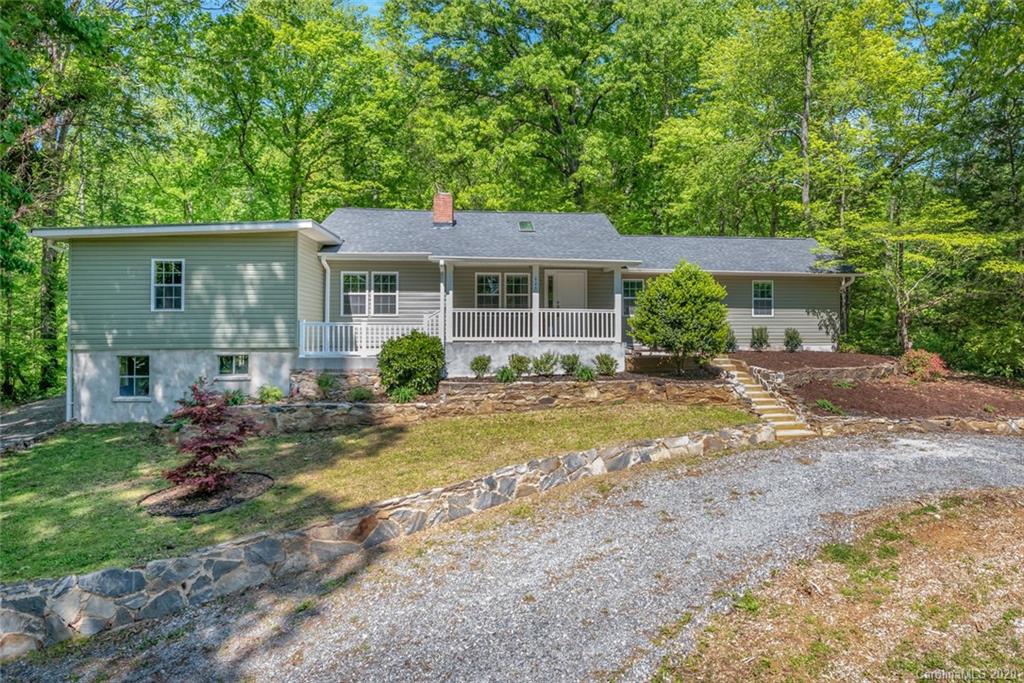 603 Vineyard Road Tryon, NC 28782 - Photo 1 of 39 front view of a house with a yard