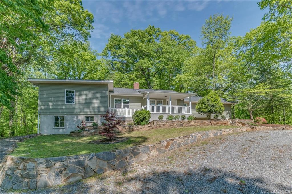 603 Vineyard Road Tryon, NC 28782 - Photo 2 of 39 front view of a house with a yard