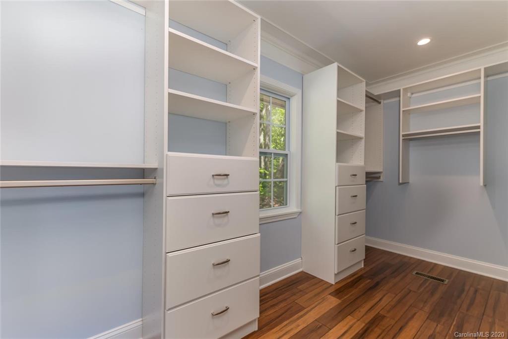 603 Vineyard Road Tryon, NC 28782 - Photo 20 of 39 a view of walk in closet with empty racks