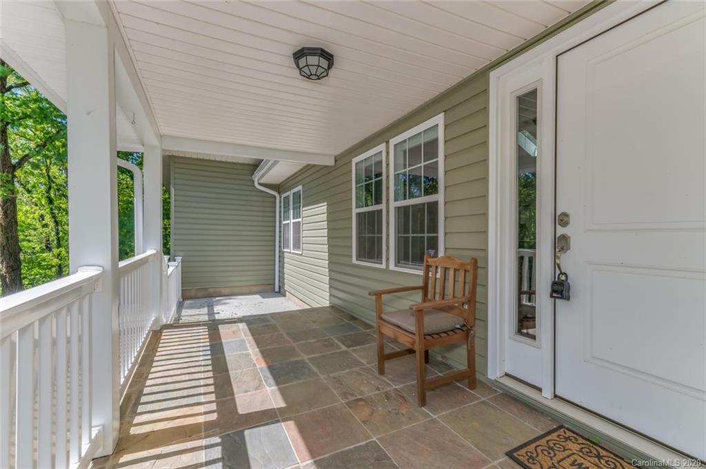 603 Vineyard Road Tryon, NC 28782 - Photo 3 of 39 a view of a two chairs in the balcony
