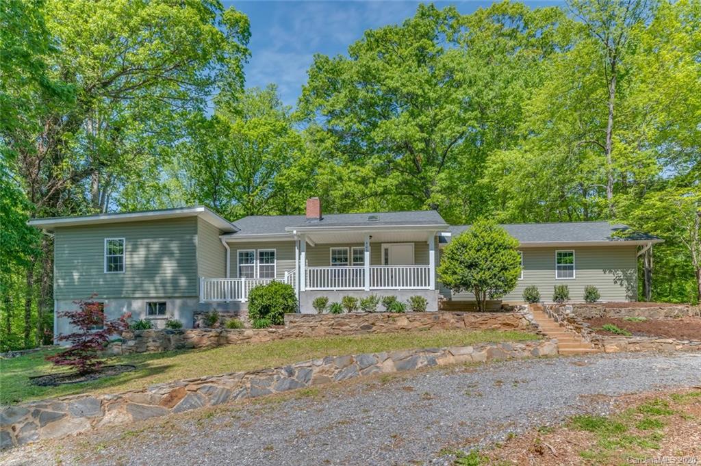 603 Vineyard Road Tryon, NC 28782 - Photo 30 of 39 front view of a house with a patio