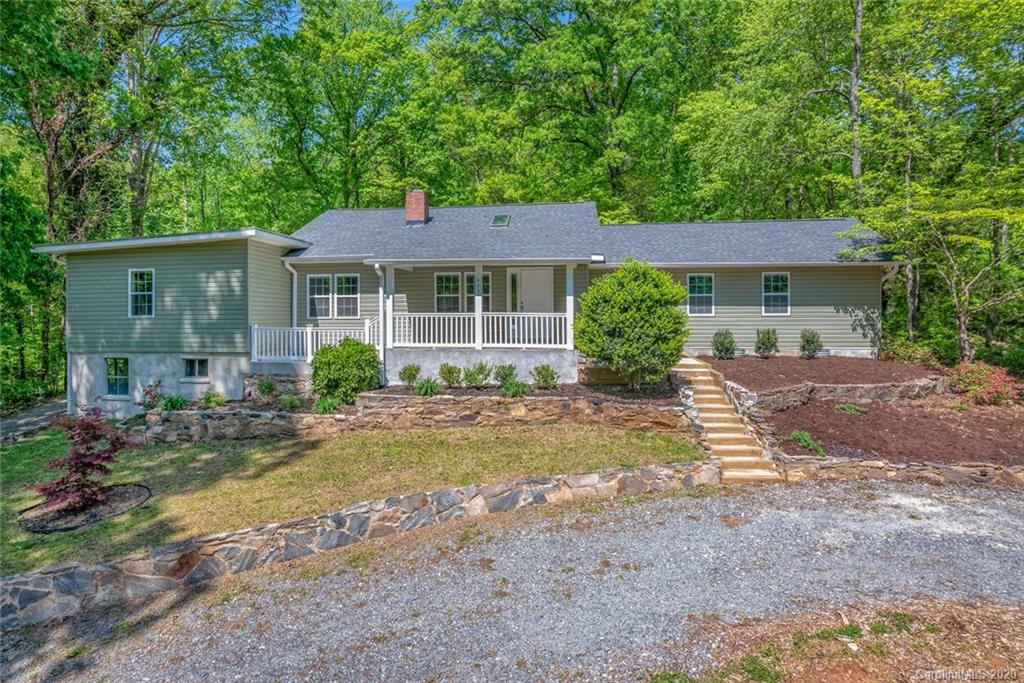 603 Vineyard Road Tryon, NC 28782 - Photo 38 of 39 a view of a house with a yard