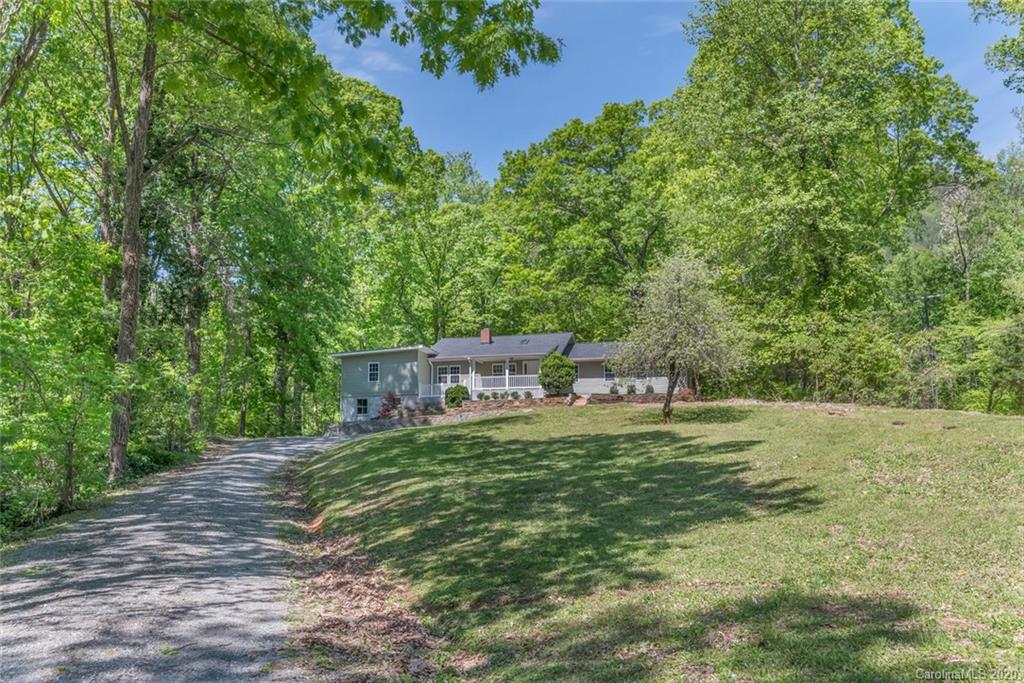 603 Vineyard Road Tryon, NC 28782 - Photo 39 of 39 a big yard with lots of green space and plants