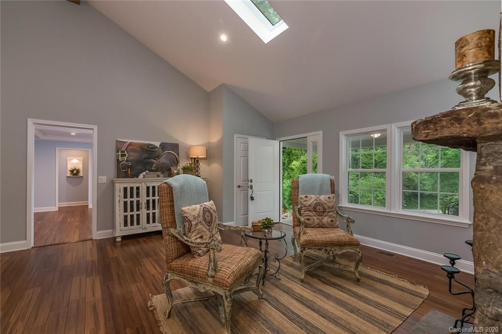 603 Vineyard Road Tryon, NC 28782 - Photo 5 of 39 a living room with furniture and a large window